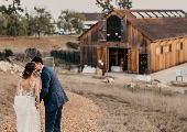 Couple in Front of Barn